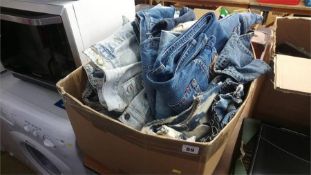 Quantity of denim jeans
