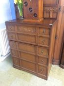 An oak double door wardrobe and a chest of drawers