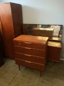 A teak Austin suite comprising wardrobe, dressing table and chest of drawers