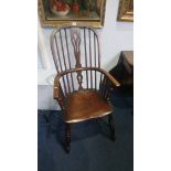 A Windsor stick back armchair, inscribed DM 1861