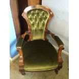 A Victorian button back armchair