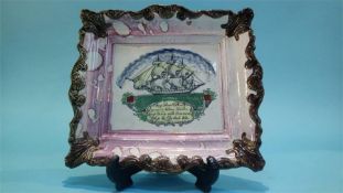 A Sunderland lustre plaque 'May Peace and Plenty'