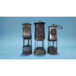 Three miners lamps