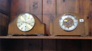 Two oak clocks