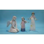 A Lladro figure of an angel and two other Lladro figures (3)