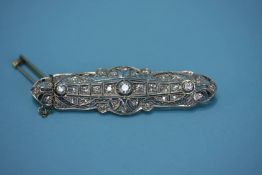 A Continental white metal Art Deco brooch, mounted with diamonds, 9.4 grams, 63.33mm x 17.36mm