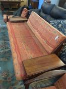 A Guy Rogers style teak fold out sofa bed