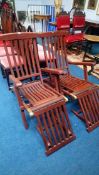 A pair of garden steamer chairs