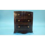 A miniature bow front chest of three drawers, 22cm wide