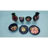Seven various pieces of Moorcroft pottery