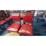 A pair of carved oak single chairs