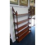 A set of mahogany barley twist five tier shelves, 107cm wide