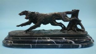 Modern bronze of dogs