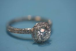 A platinum and diamond ring, the central stone approx. 1ct, size M/N, 5 grams