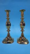 A pair of brass candlesticks