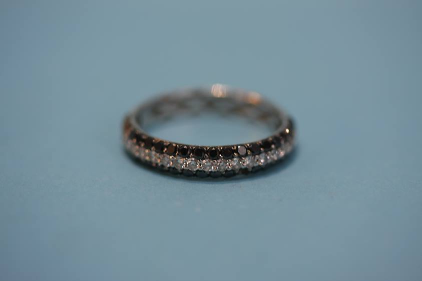 An 18ct (750) black and white diamond ring, size 2, 2.5 grams - Image 3 of 3