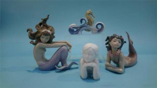 Two Lladro mermaids and two other figures (4)