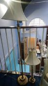 A gilt metal standard lamp and matching table lamp