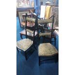 A pair of ebonised Mackintosh style chairs