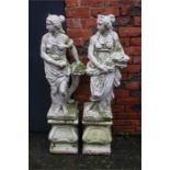 Two garden statues on plinths