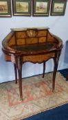 A French style burr walnut Ladies writing desk, with raised back, curving sides and single frieze
