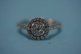 An 18ct white gold and diamond engagement ring, size J, 2.8 grams