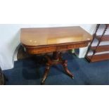 A 19th century mahogany fold over tea table, 91cm wide