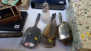 Silver backed brush sets and a sugar caster