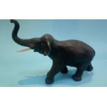 A large heavy bronze model of an elephant, 42cm length and 30cm high (max)
