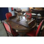 A wind out dining table and four chairs