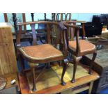 A pair of mahogany corner chairs