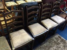 Four oak dining chairs