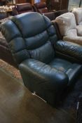 A green leather Lazy Boy recliner with fridge