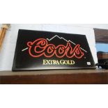 A 'Coors Extra Gold' light