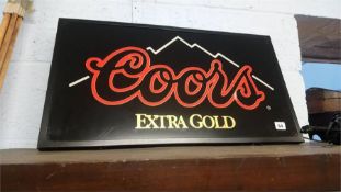 A 'Coors Extra Gold' light