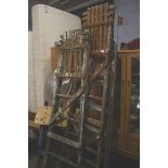 Two pairs of wooden step ladders