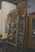 Two pairs of wooden step ladders