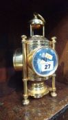A brass desk barometer