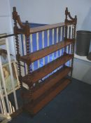 A set of barley twist hanging shelves