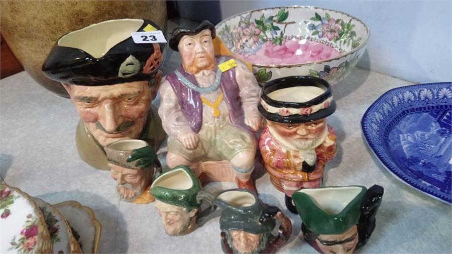 Various Royal Doulton Toby jugs etc.