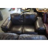 Brown leather two seater settee