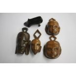 Various carved heads