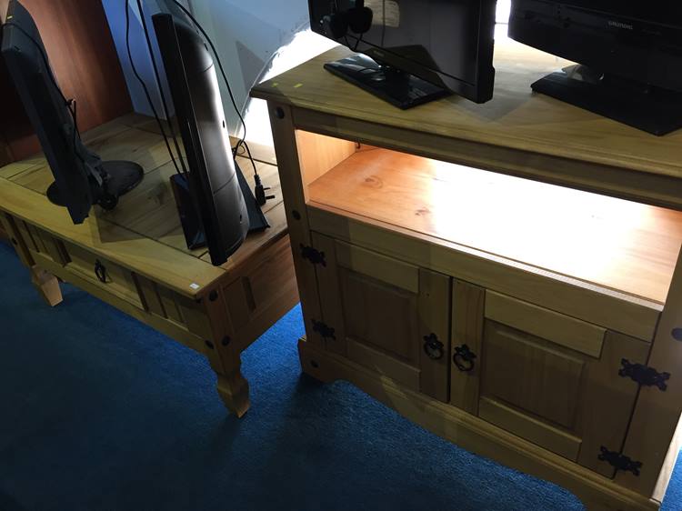 A pine coffee table and a pine stick cabinet
