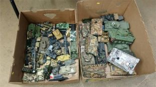 A collection of model tanks, in two boxes
