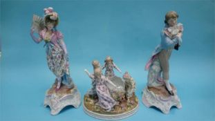 A pair of Continental porcelain figures of a gallant and lady, marks in underglaze blue, 41cm height