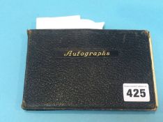 An autograph book including Laurel and Hardy and others