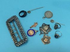 Bag of assorted including a buckle, silver fob etc.