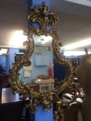 A pair of gilded reproduction mirrors