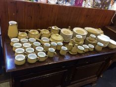 A large collection of Denby stoneware pottery