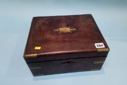 A mahogany box and contents